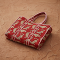 Quilted tiger block print tote bag on sandstone surface